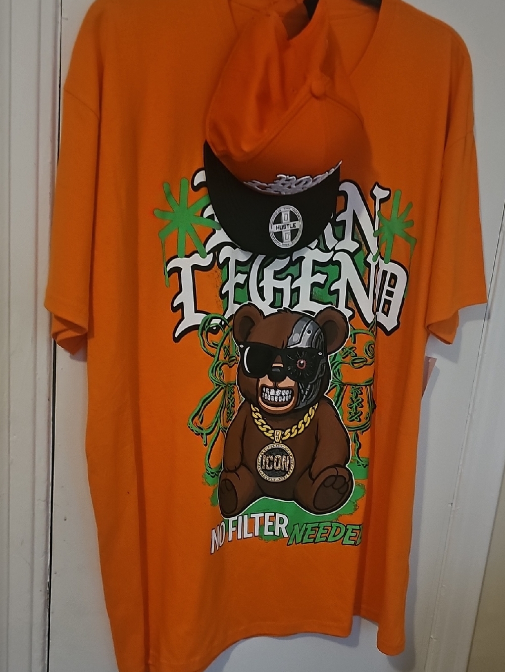 Hustler Hollywood Orange Graphic Tee with Bear Chain Print